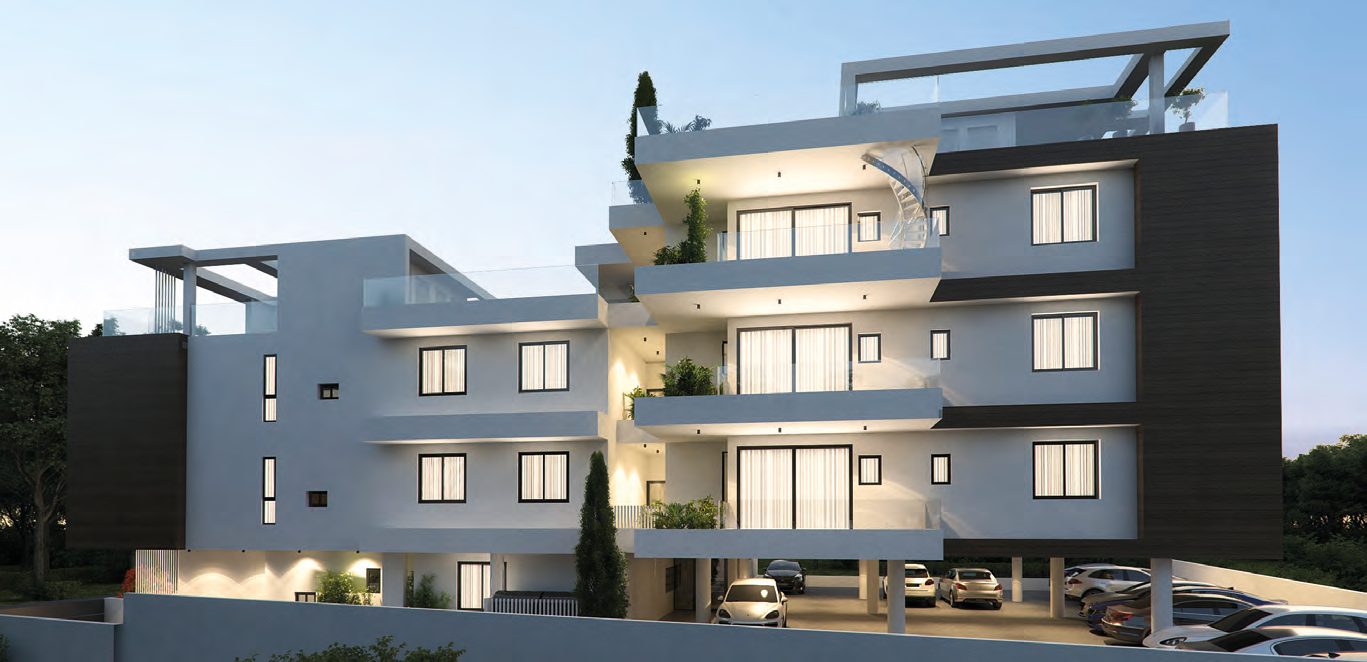 The rear of Aradippou Pearl at dusk, the parking court lit below the balconies — architect's visualisation